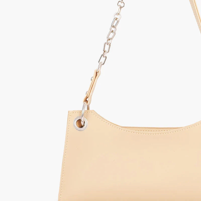 Novabazzar Off-white elongated chain handle purse
